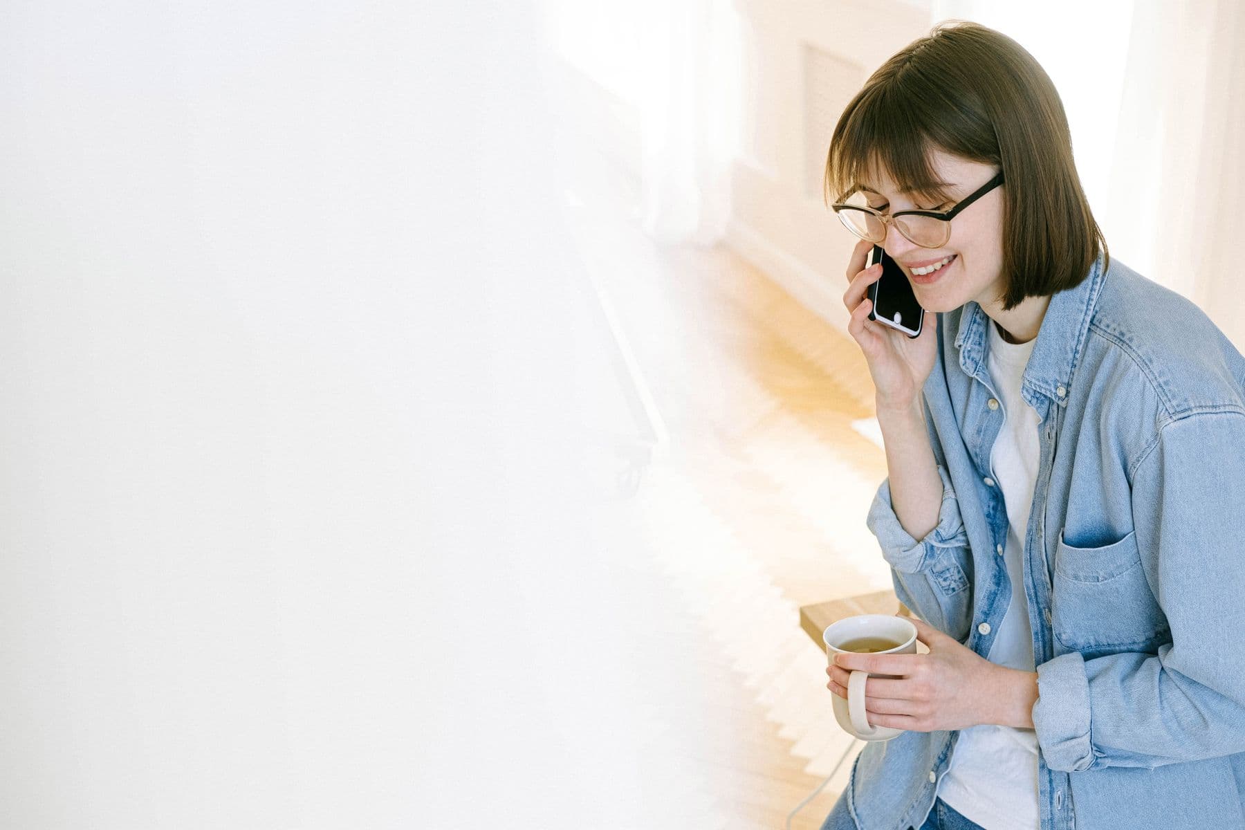 A welcoming person taking a call.