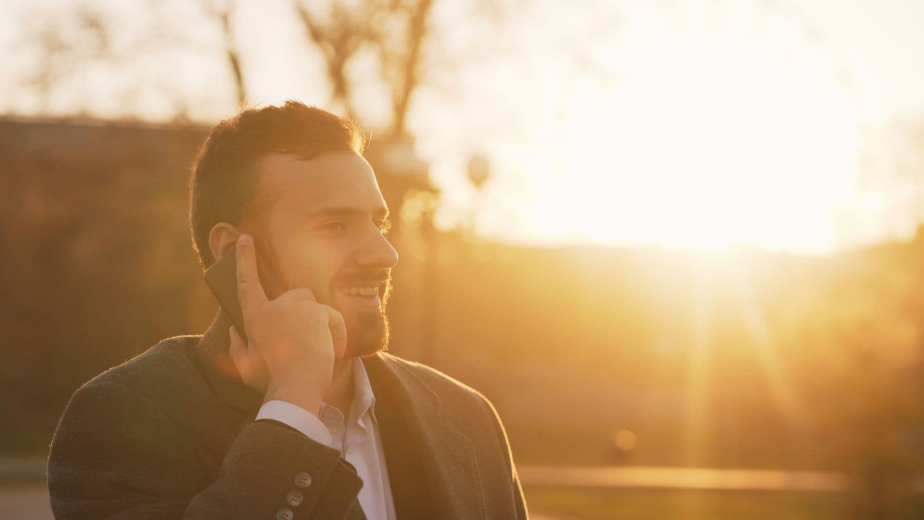 A person on a calm phone call — the safe first step.
